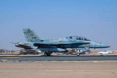 A Kuwait air force F/A-18 Super Hornet certifies the mobile aircraft arresting system (MAAS)