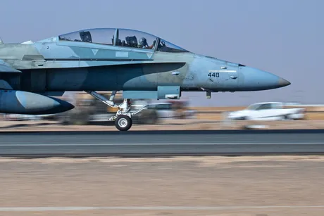 A Kuwait air force F/A-18 Super Hornet certifies the mobile aircraft arresting system (MAAS)