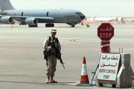 Security Policeman Airman 1st Class Chris Culross stands guard at the Flightline Entry Control Point at Prince Sultan Air Base, Al Kharj, Saudi Arabia